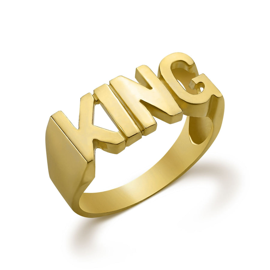 10k yellow gold ring with block letters spelling KING on white background