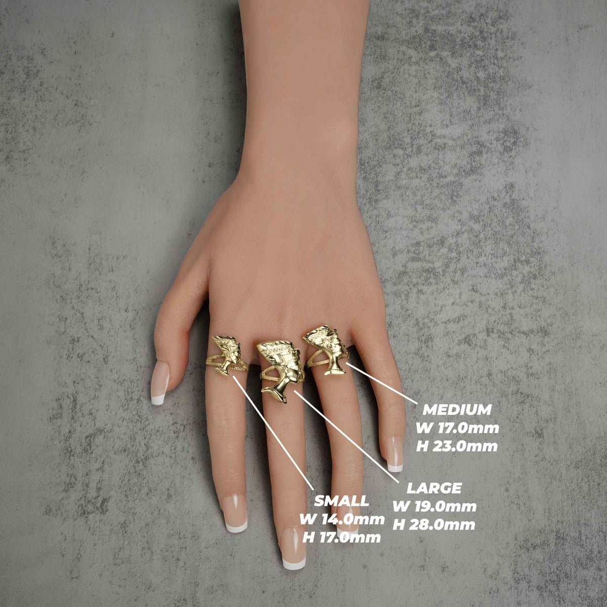 Hand wearing three 10k gold Nefertiti rings with small, medium, and large size labels.