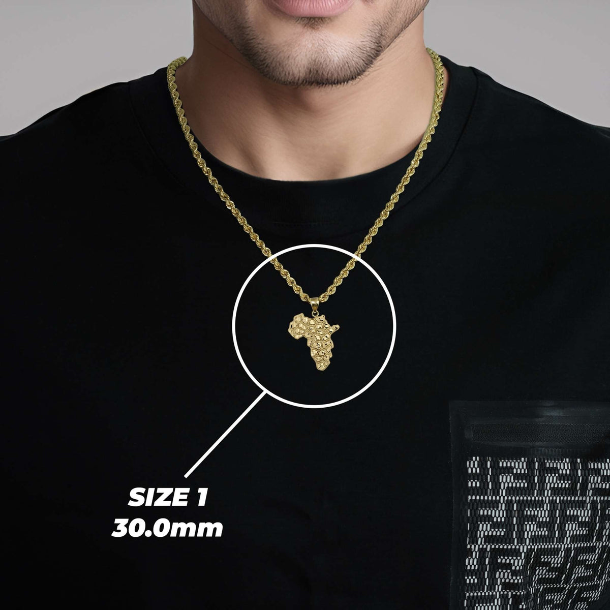 Man wearing the 10k Gold Classic Nugget Africa Map Pendant showing Size 1 dimensions.