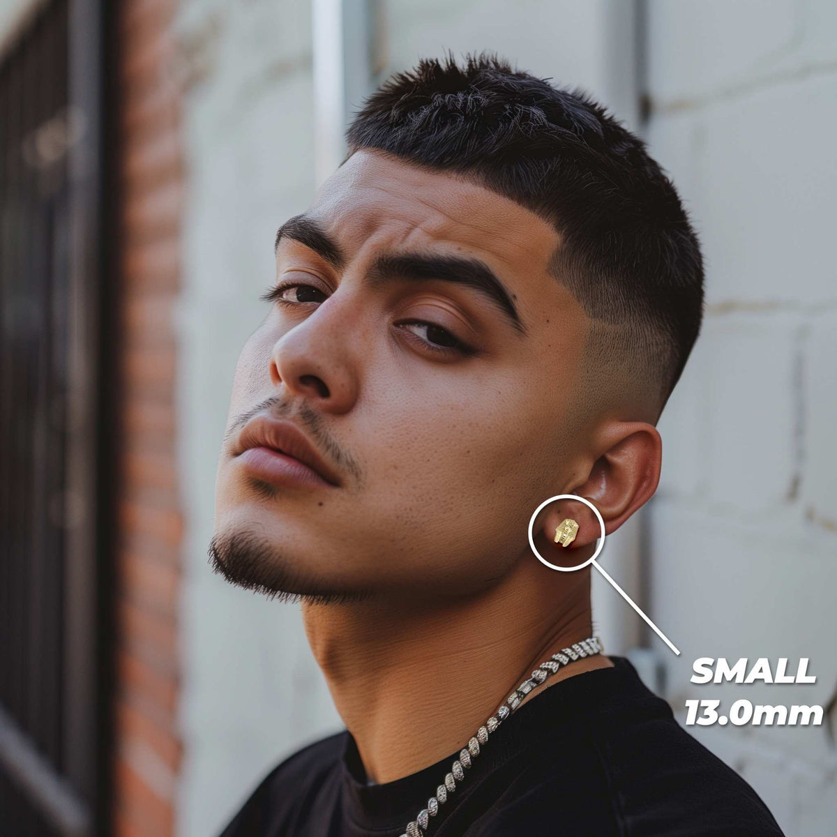 Man wearing a small 13.0mm gold Pharaoh stud earring with size label callout.