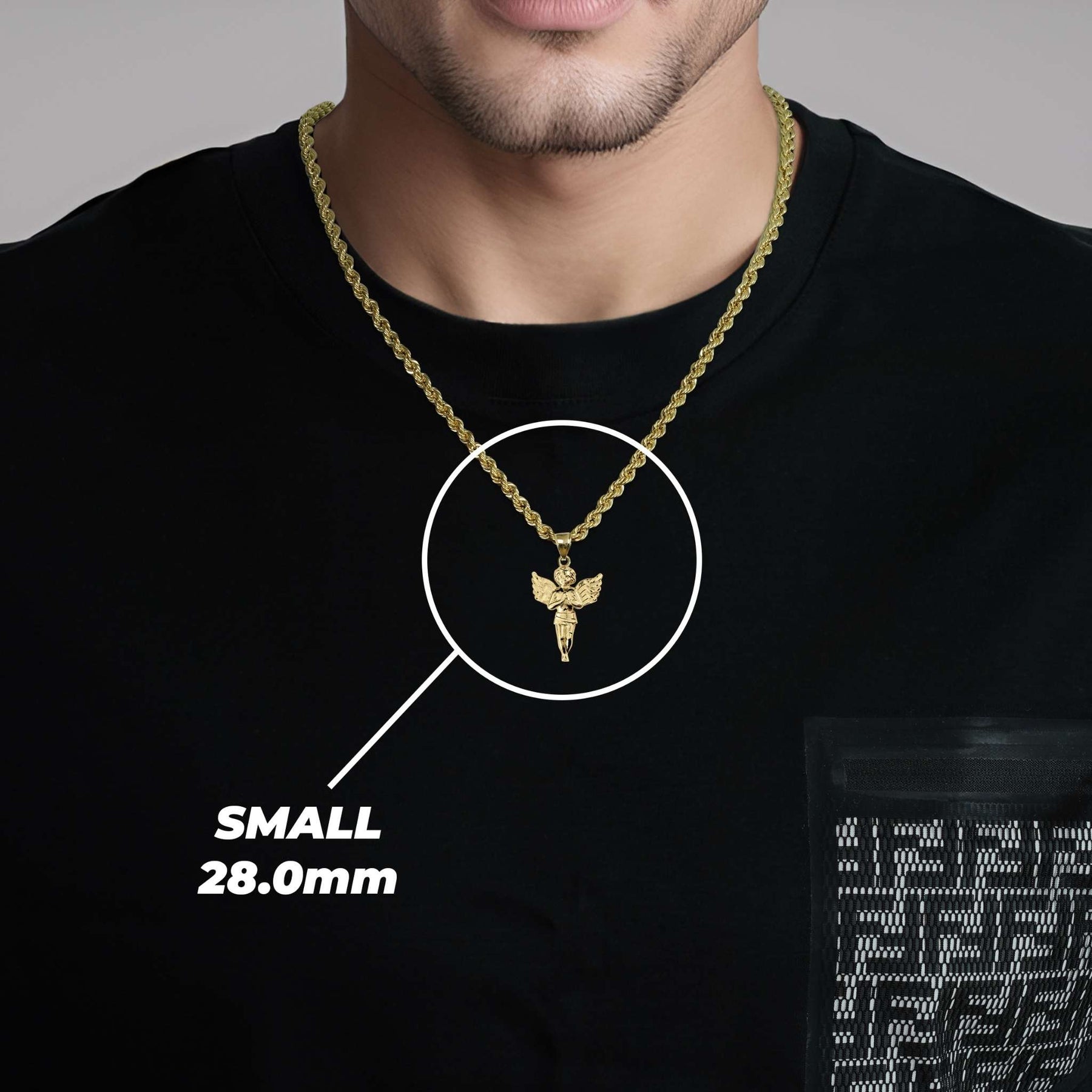 A man wearing a small gold angel pendant labeled SMALL 28.0mm.