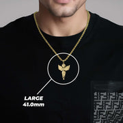 A man wearing a large gold angel pendant labeled LARGE 41.0mm.