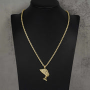 Polished 10k gold Queen Nefertiti pendant hanging on a rope chain, displayed on a bust.