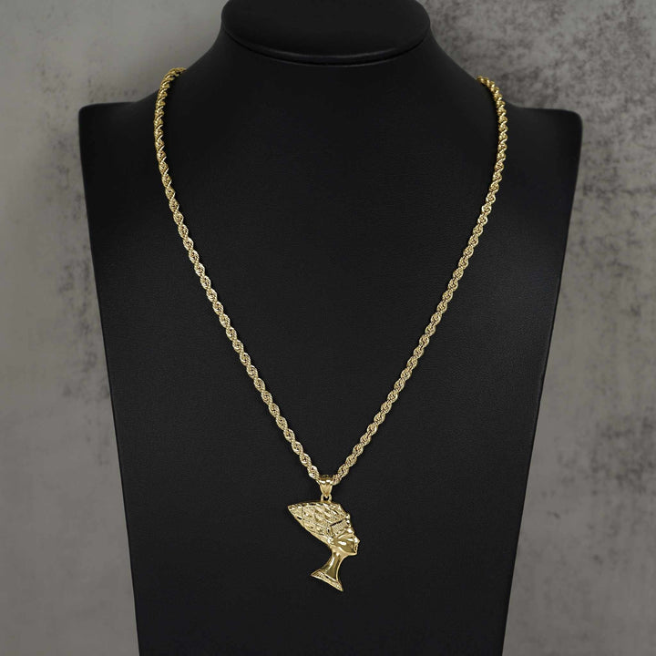 Polished 10k gold Queen Nefertiti pendant hanging on a rope chain, displayed on a bust.