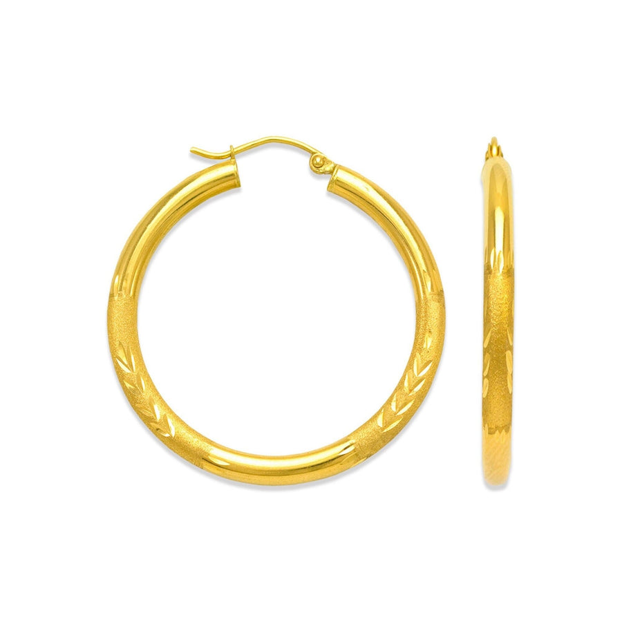 Pair of 10k yellow gold round hoop earrings with a diamond-cut textured finish.