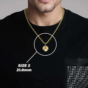 A man wearing a medium 10k gold classic soccer ball pendant and size 2 label on a black shirt.