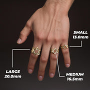 Hand wearing small, medium, and large gold Star of David rings with size measurements.