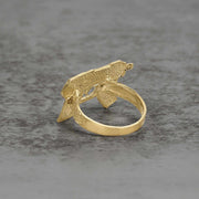 Back view of a 10k gold classic Uzi ring showing the inner band on stone.