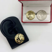 10k gold globe stud earrings on a display stand and in a jewelry box.
