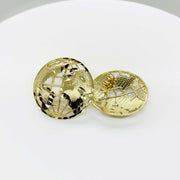 Pair of 10k yellow gold globe stud earrings featuring a detailed cut-out world map.
