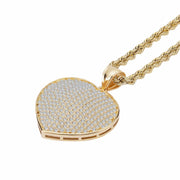 10k yellow gold pavé-set CZ heart pendant hanging from a matching rope chain.