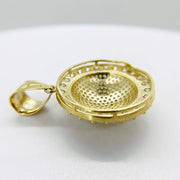 Rear view of a yellow gold iced-out round medallion pendant showing inner structure.