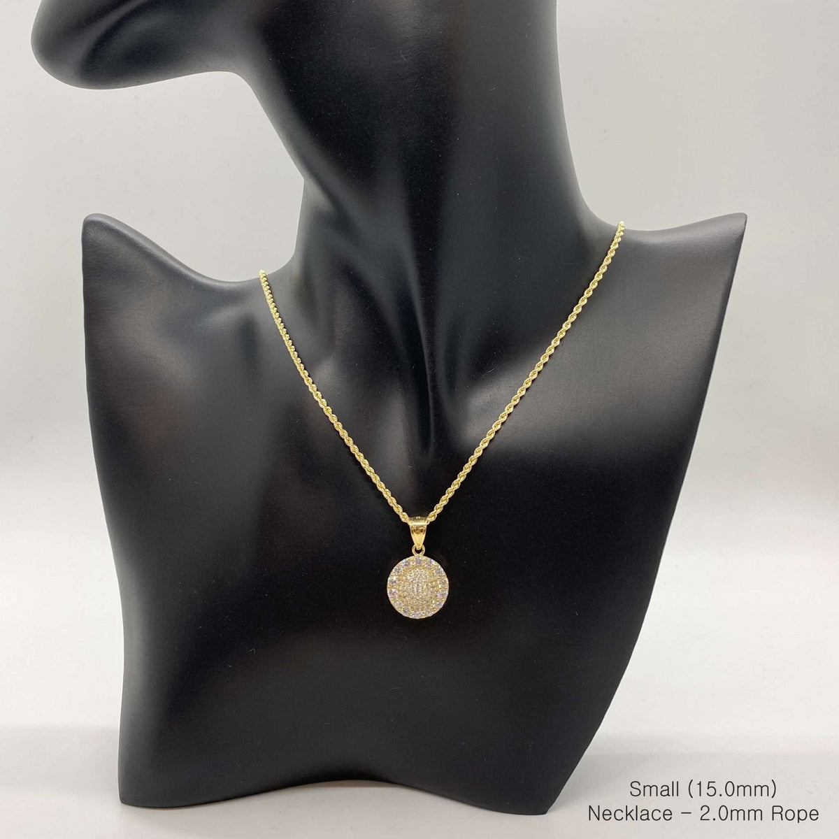 Small 15.0mm gold convex round CZ pendant on a 2.0mm rope chain displayed on a mannequin