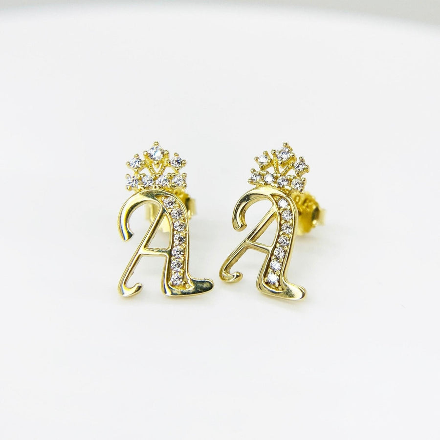 10k solid gold personalized cursive A initial stud earrings featuring sparkling cubic zirconia crown accents.