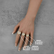 Three yellow gold pavé cubic zirconia heart rings with small, medium, and large dimensions.