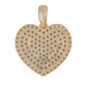 A heart-shaped yellow gold pendant with a solid polished back and a bail.
