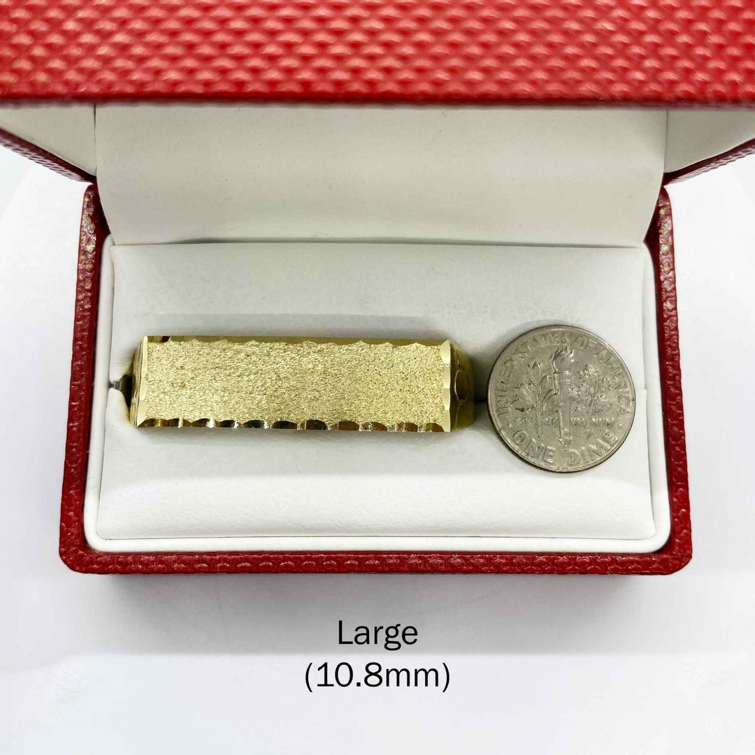 10k Gold Classic Flat Double Finger in a red jewelry box with a coin for scale on a white background