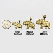 Three sizes of 10k solid gold diamond-cut elephant pendants displayed next to a quarter on a plain background.