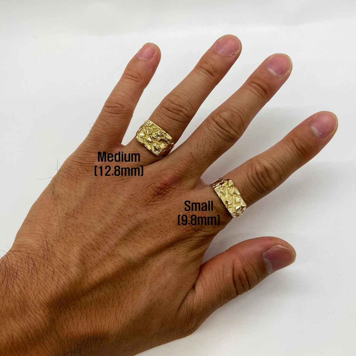 two 10k Gold Epoch Nugget Ring
on a hand with size labels.