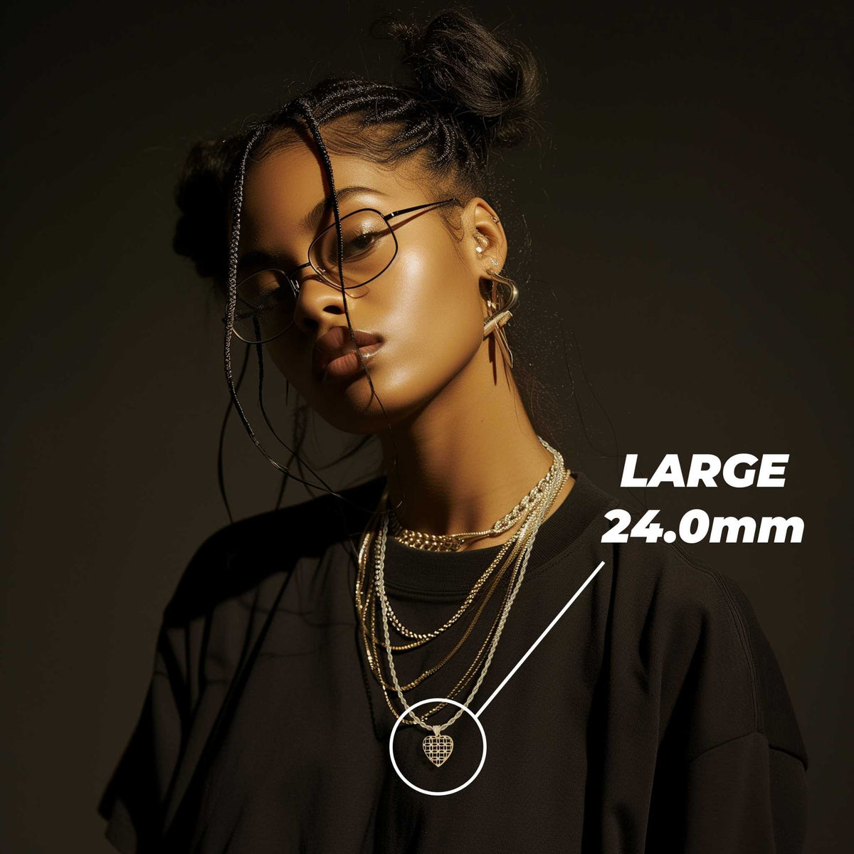 Model wearing the Large 24.0mm gold filigree puff heart pendant necklace.