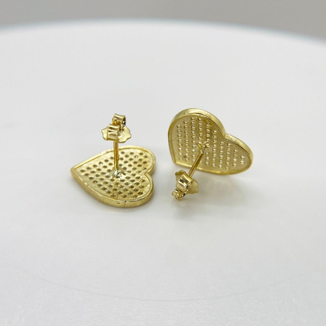 Back view of 10k yellow gold heart stud earrings showing the secure push-back closures.