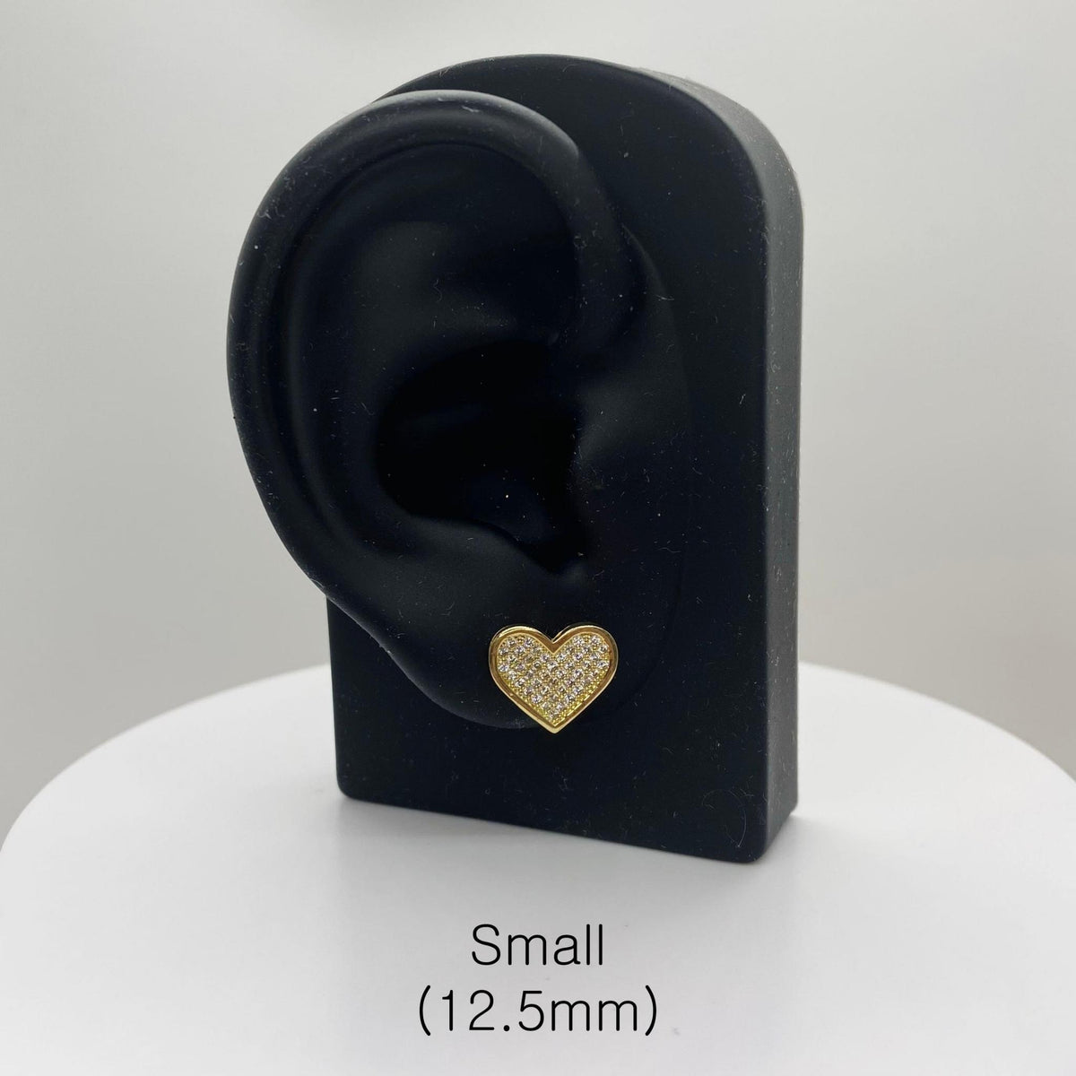 12.5mm small iced-out heart stud earring, 10k gold jewelry, professional product display.