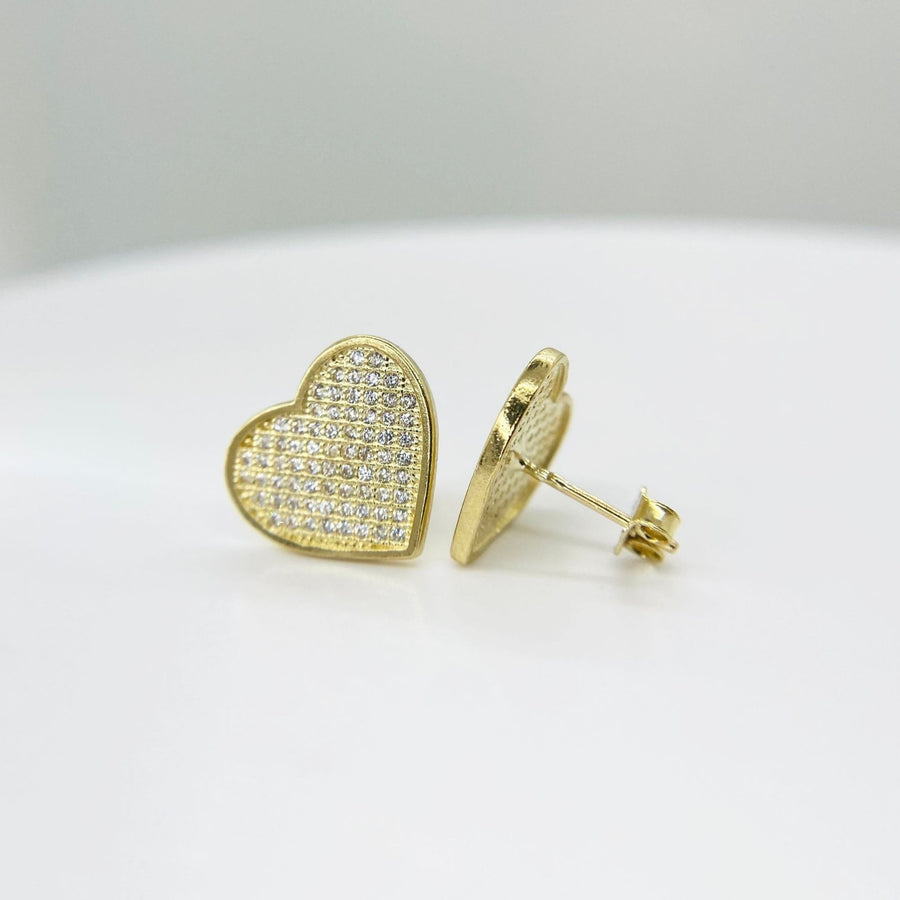 Pair of 10k yellow gold heart-shaped stud earrings covered in shimmering cubic zirconia stones.
