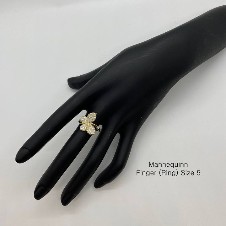 10k Gold butterfly ring on a black mannequin hand with text indicating size 5.