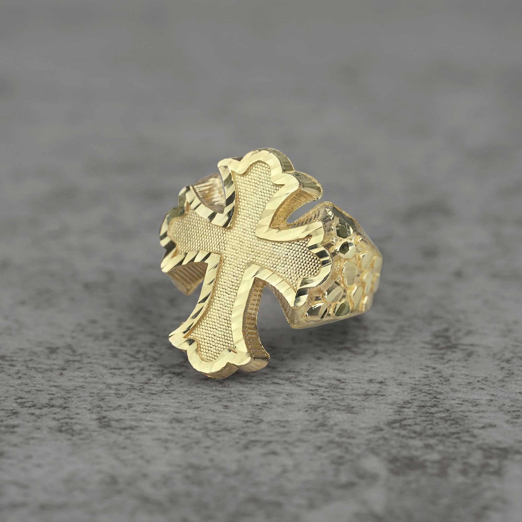 10k Gold Gothic Cross Nugget Ring front view on a gray backgroud