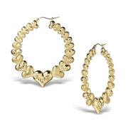 Pair of 10k gold hoop earrings featuring a unique interconnected heart design.