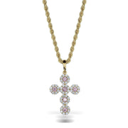 Hex-shaped gold cross pendant set with pink center stones and clear pavé CZ borders.