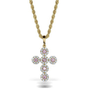 10k yellow gold hexagon cross pendant featuring pink and clear cubic zirconia on a twisted chain.