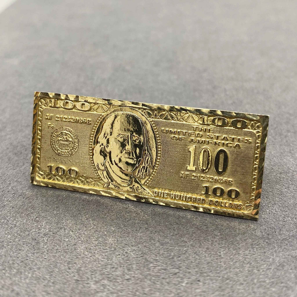 10k Gold two finger ring with hundred dollar bill design front view.
