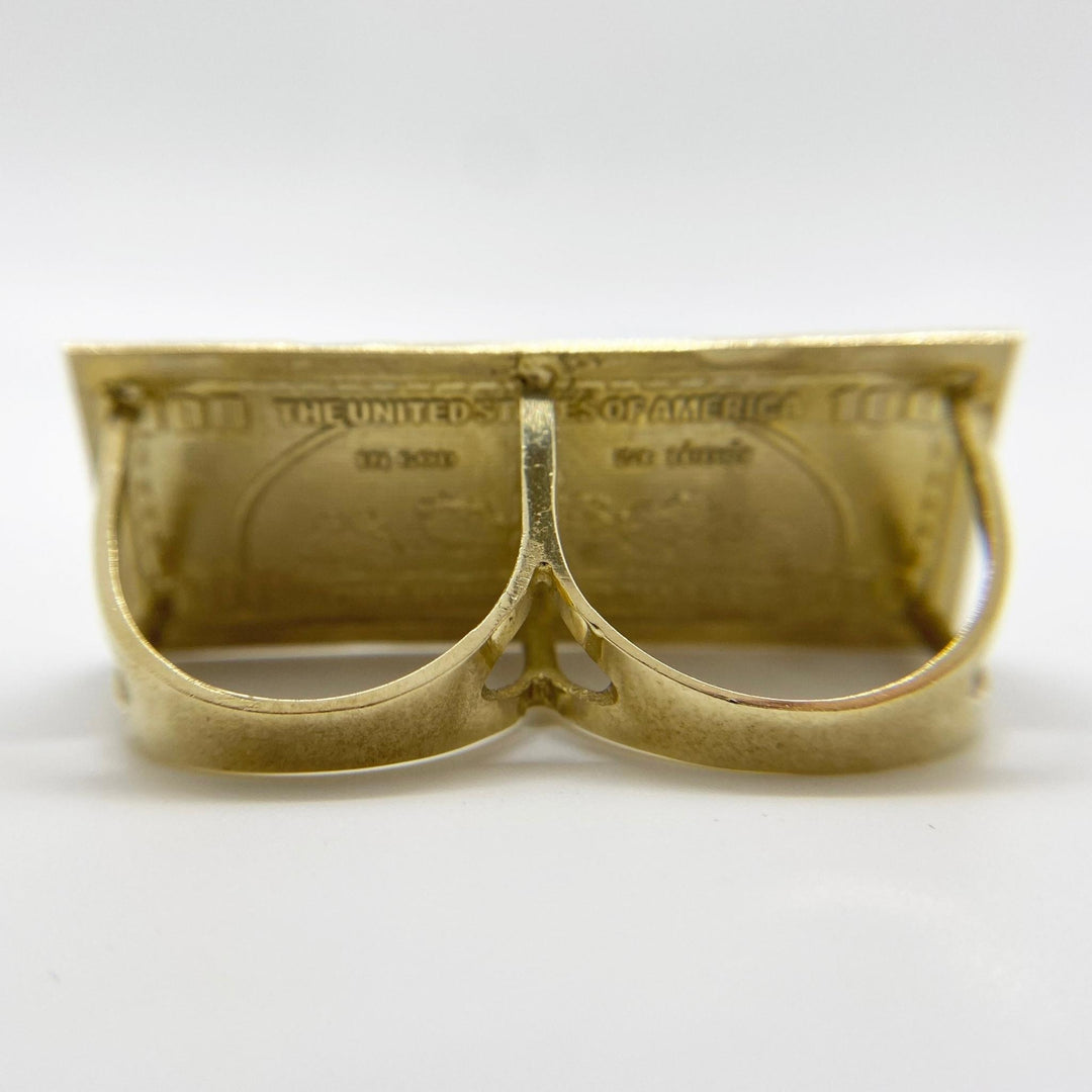 10k Gold ring shaped like a dollar bill back view on a white background