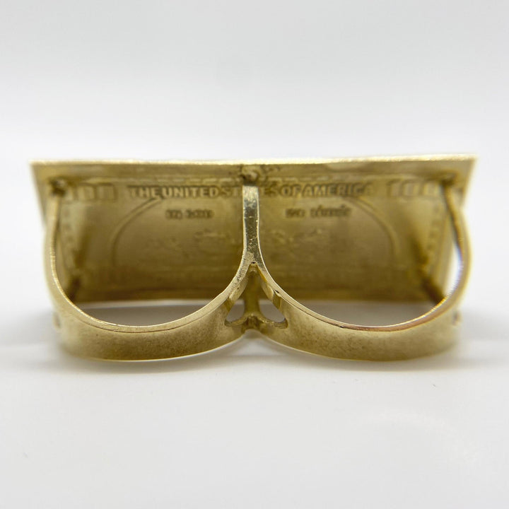 10k Gold ring shaped like a dollar bill back view on a white background