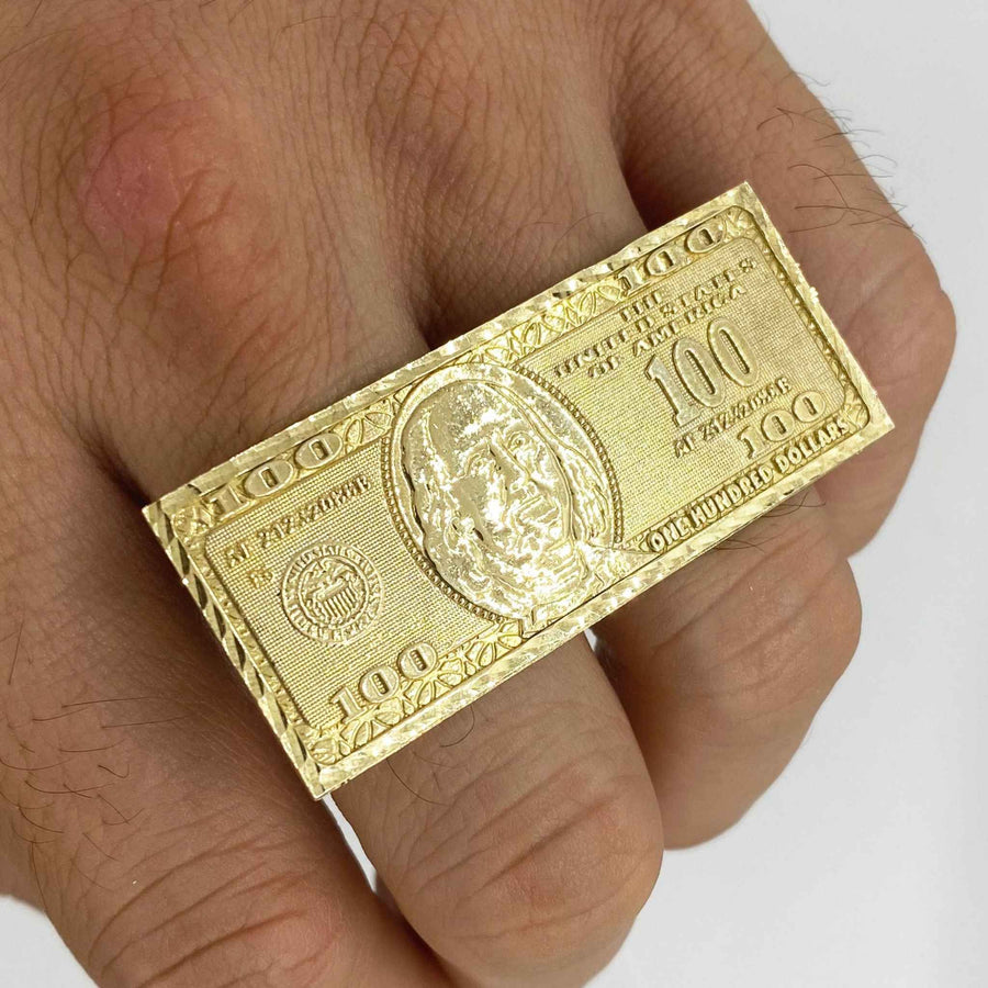 hand wearing 10k Gold two finger ring with Hundred Dollar Bill design. 