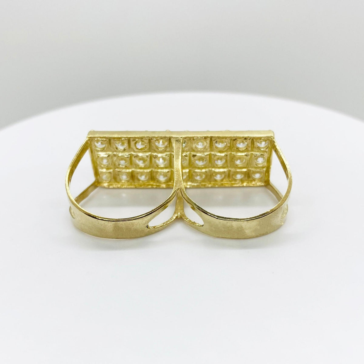 10k Gold Iced Two Finger Ring with rectangular design back view a white background