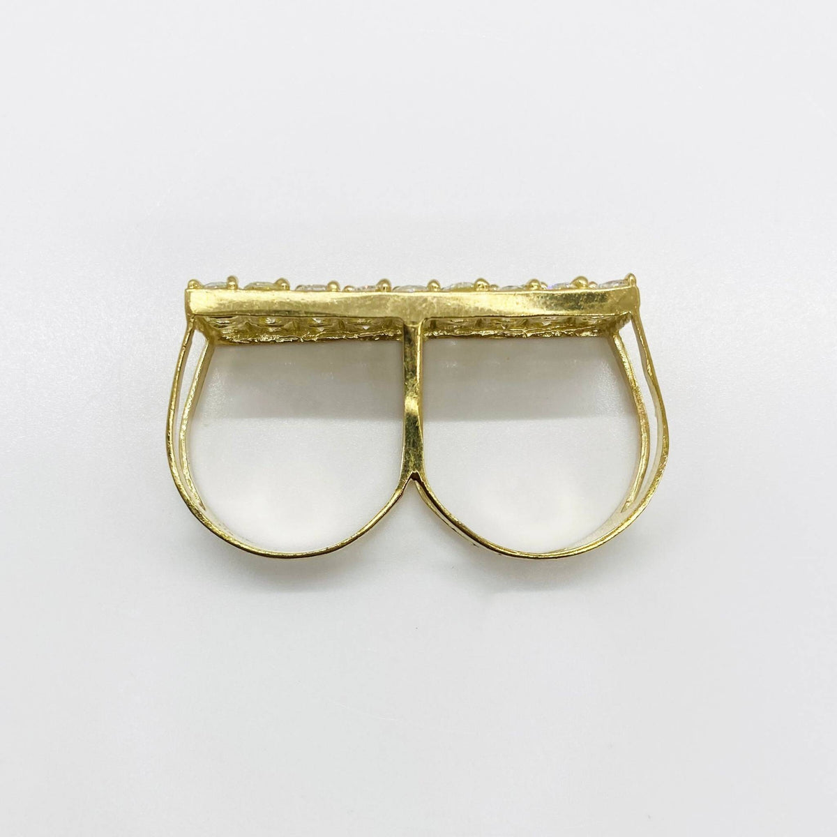 10k Gold Iced Two Finger Ring top view on a white background