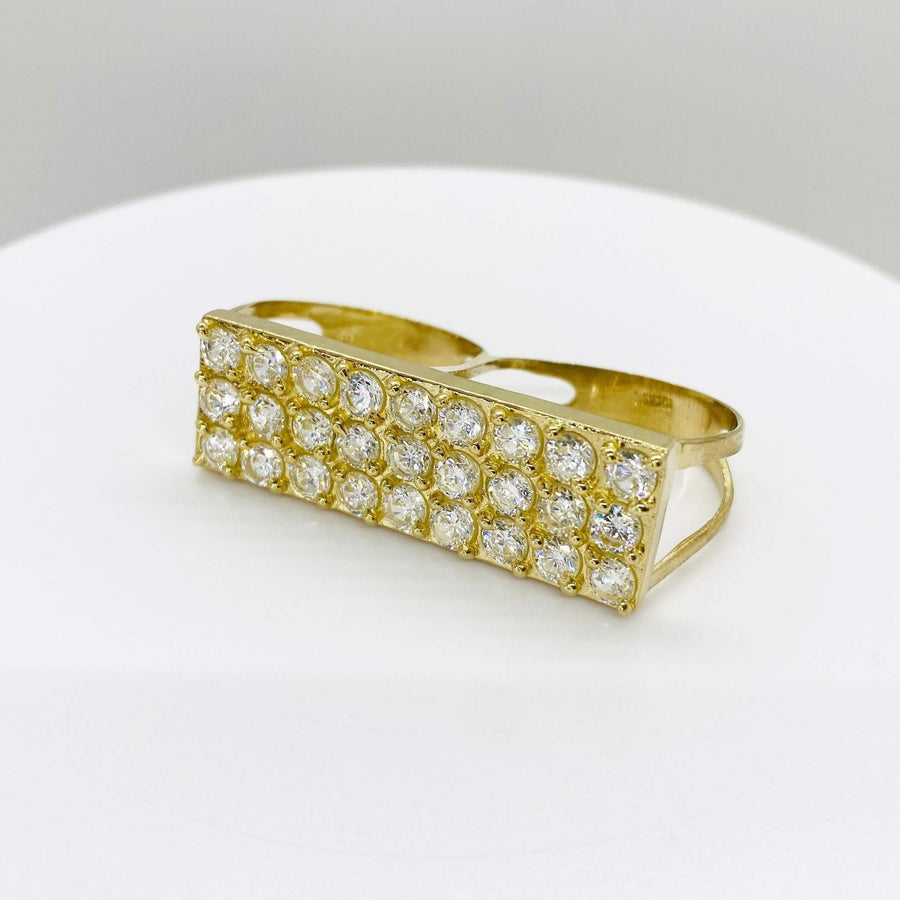 10k Gold Iced Two Finger Ring with  cubic zirconia stones on a white background