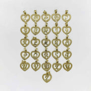 10k yellow gold alphabet initial letter Rollie heart pendants displayed on white background.