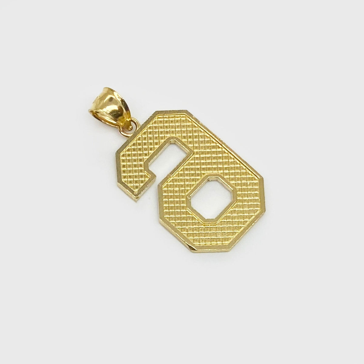 10k solid yellow gold diamond cut number 6 jersey charm pendant.