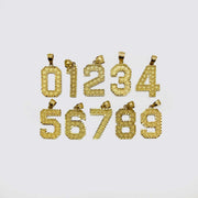 Ten textured yellow gold number pendants, zero through nine, arranged on a light background.