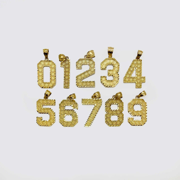 Ten textured yellow gold number pendants, zero through nine, arranged on a light background.
