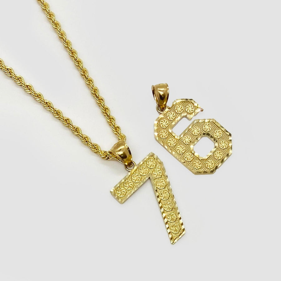 Yellow gold number 7 and 6 pendants with textured pattern on a rope chain.