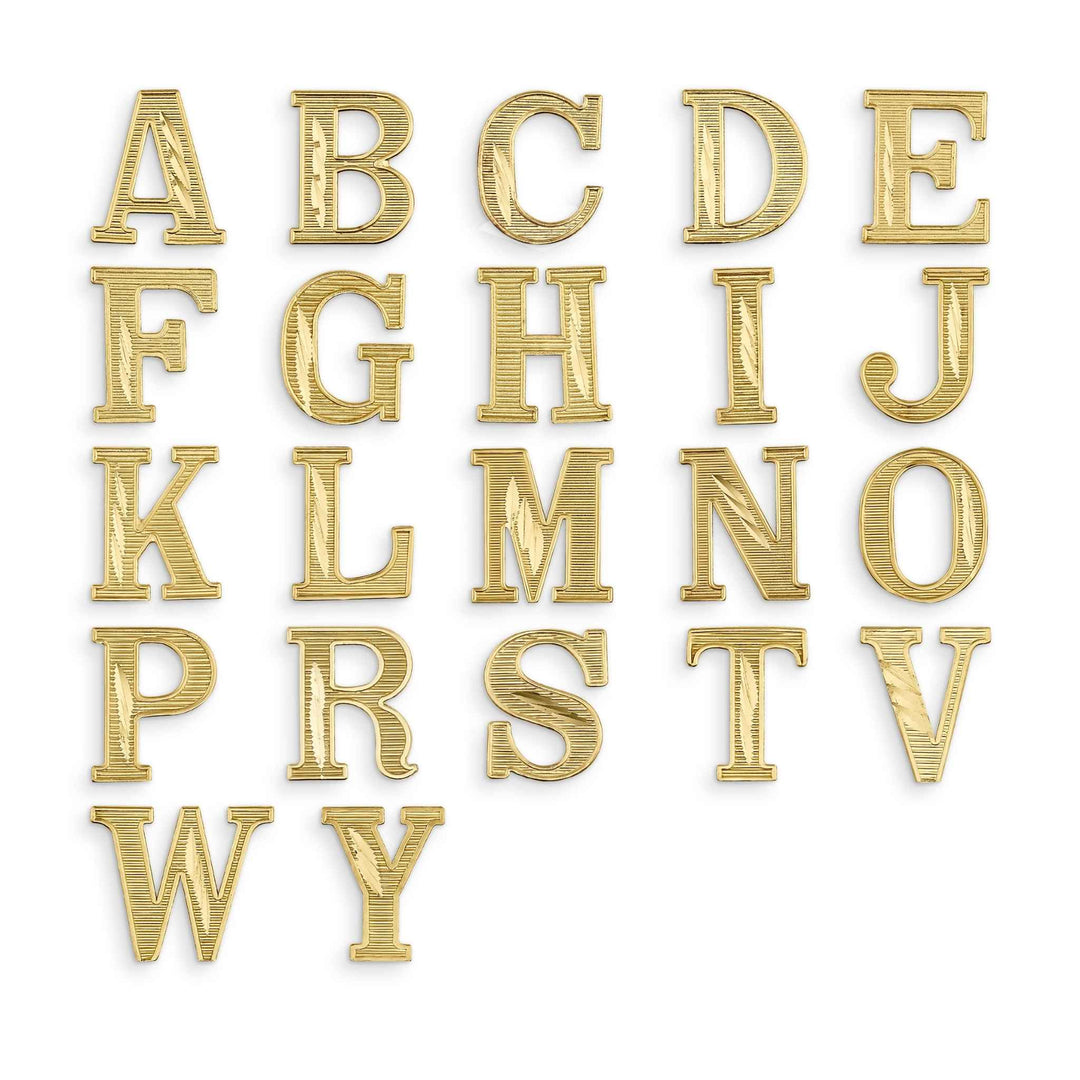 A collection of 10k yellow gold alphabet letter studs with a diamond-cut textured finish.
