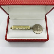 10k Gold Kids Double Finger Ring and silver coin in a red box on a white background