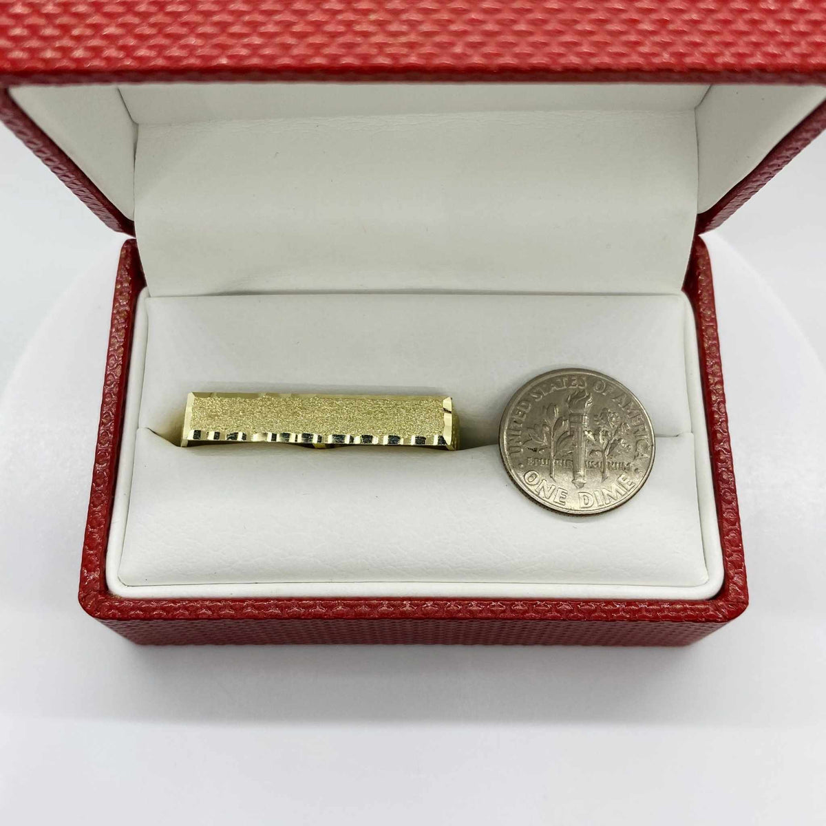10k Gold Kids Double Finger Ring and silver coin in a red box on a white background