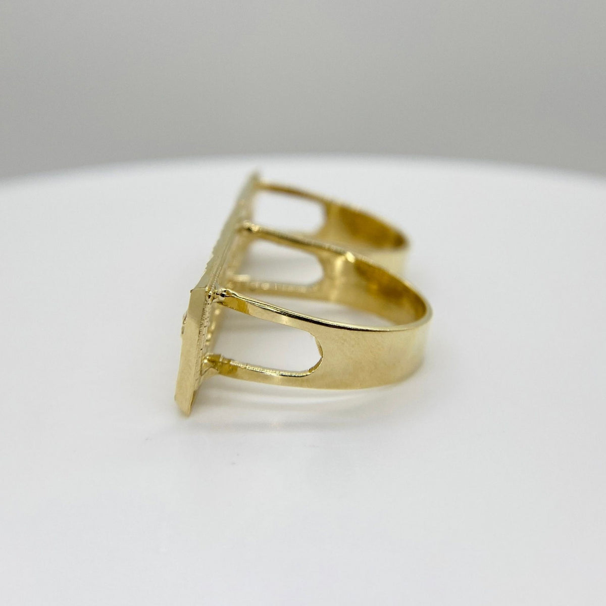 10k gold two finger ring with Last Supper design side view on a white background