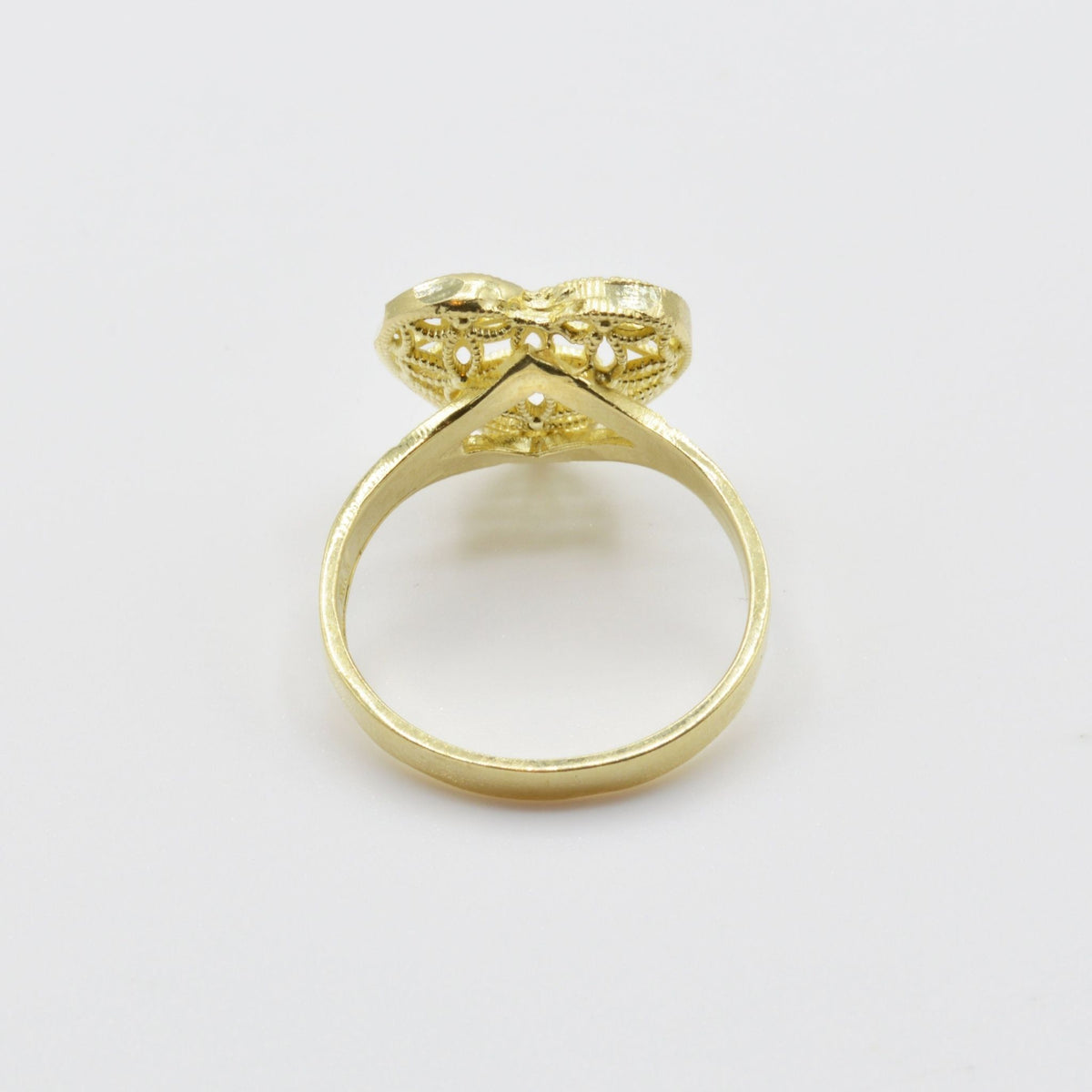 10k Gold ring with mesh heart design back view on a light gray background