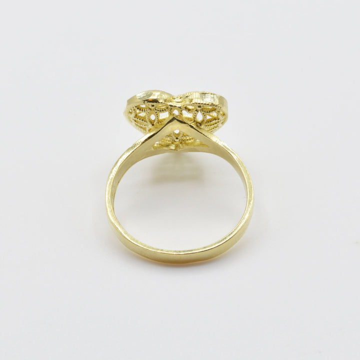 10k Gold ring with mesh heart design back view on a light gray background